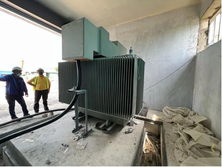 Step-up transformer installed inside a building