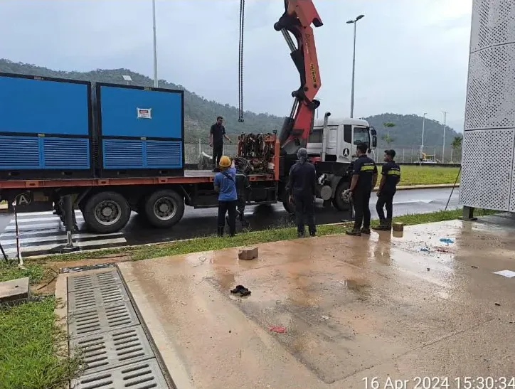 Generator being positioned during a manufacturing shutdown